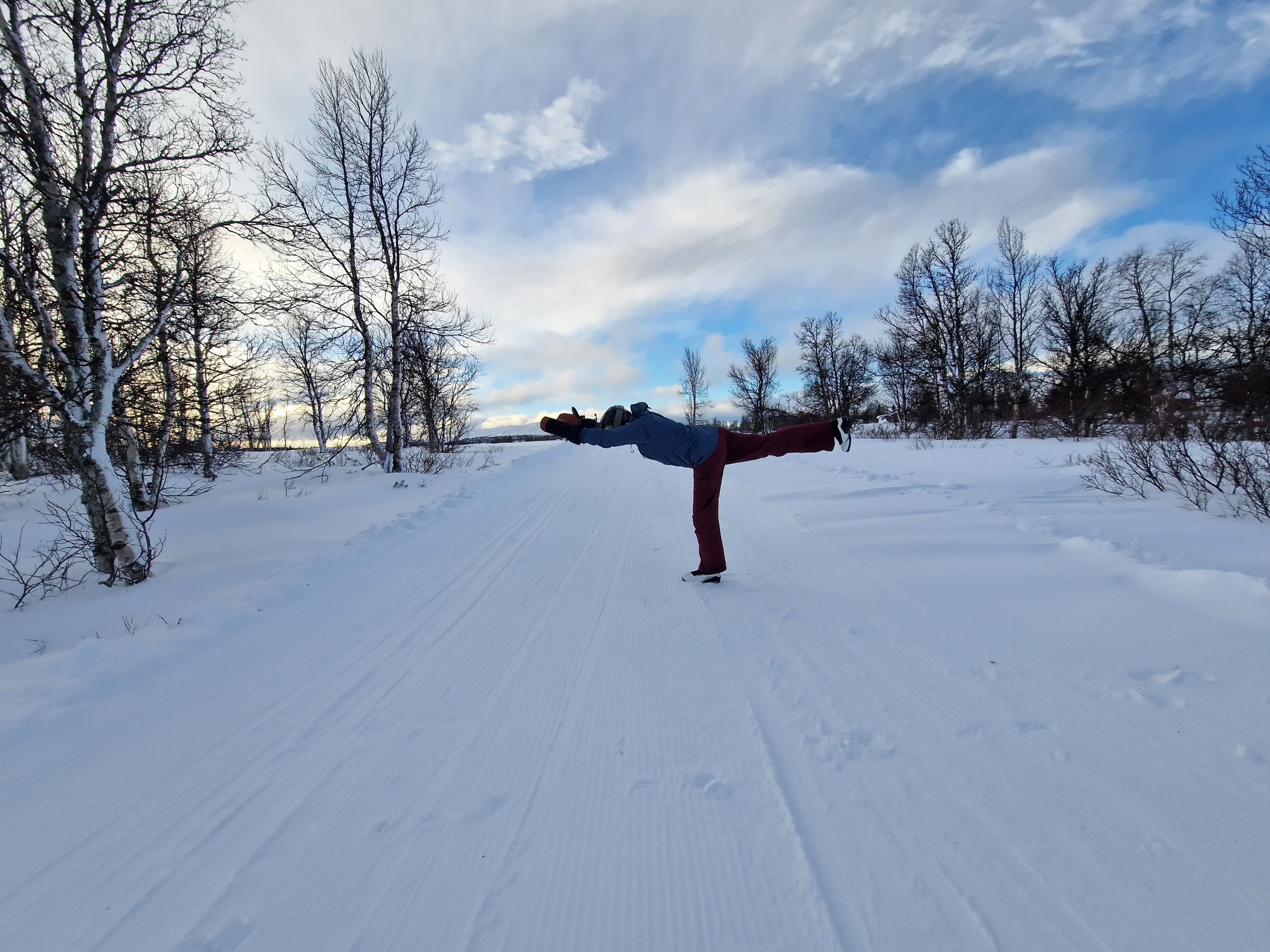 Shruti demonstrating Warrior III pose